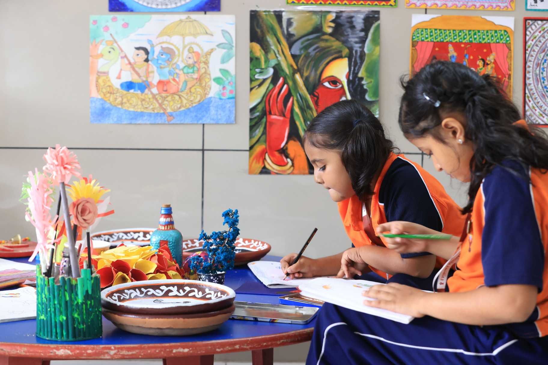 Students participating in an art and creative learning activity at Vishwa Vidyapeeth